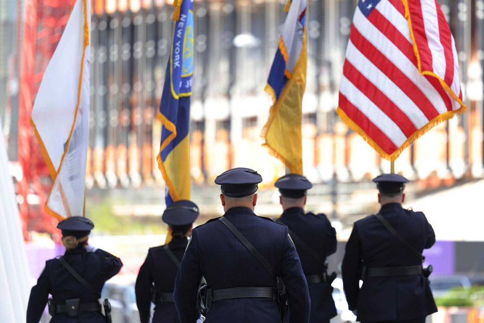 Port Authority Police Color Guard march during a Port Authority Interfaith Remembrance Service on the 20th anniversary of September 11th at the North Oculus Plaza on September 11, 2021 in New York City
