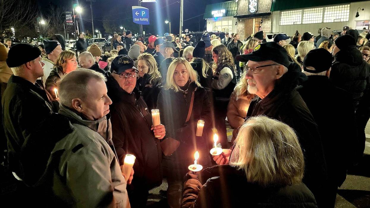 Port Huron residents gather for vigil after death of Joshua Conant