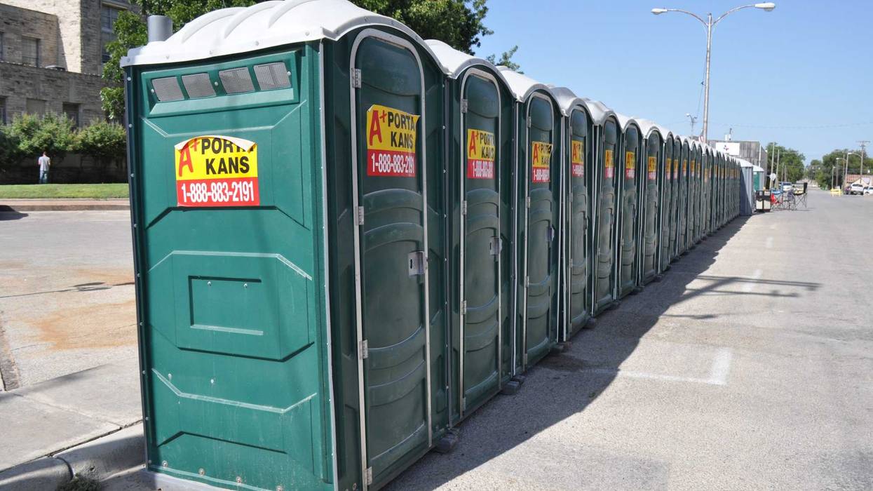 Portable toilets are lined up on the Comanche County Courthouse square Wednesday, Aug. 21, 2019, as the city conserves water while recovering from a major water line break. Comanche Water Dsc 7682
