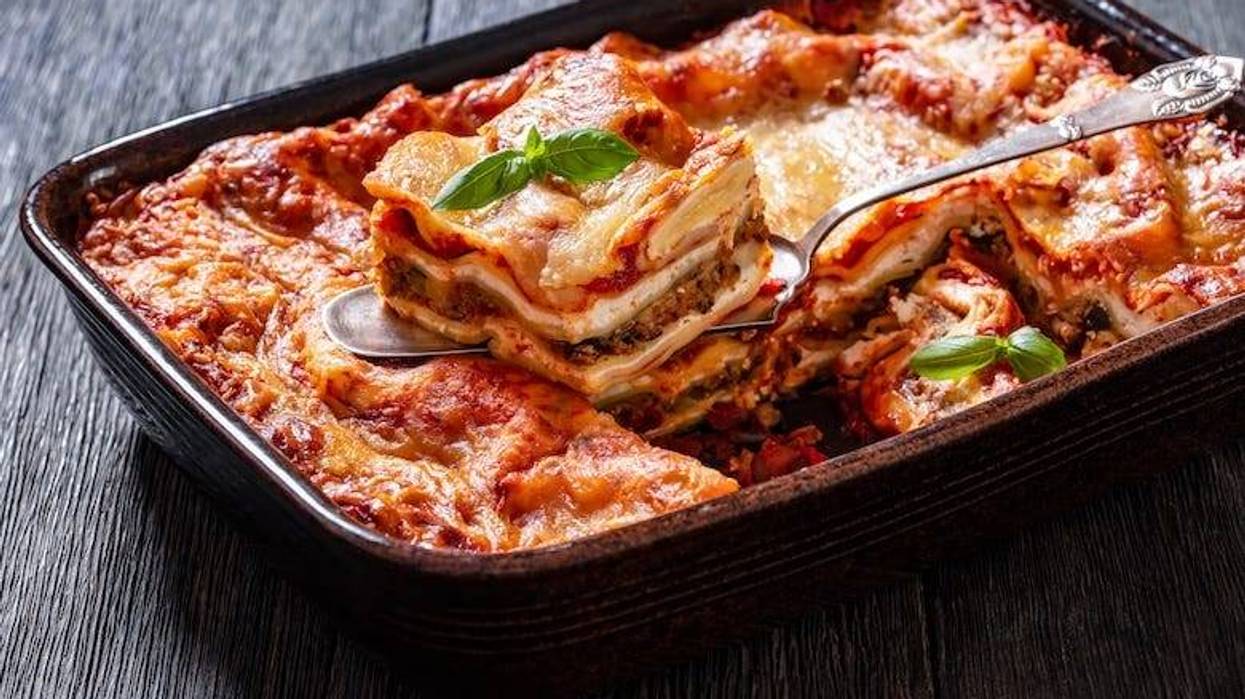 Portion of lasagna in a baking dish