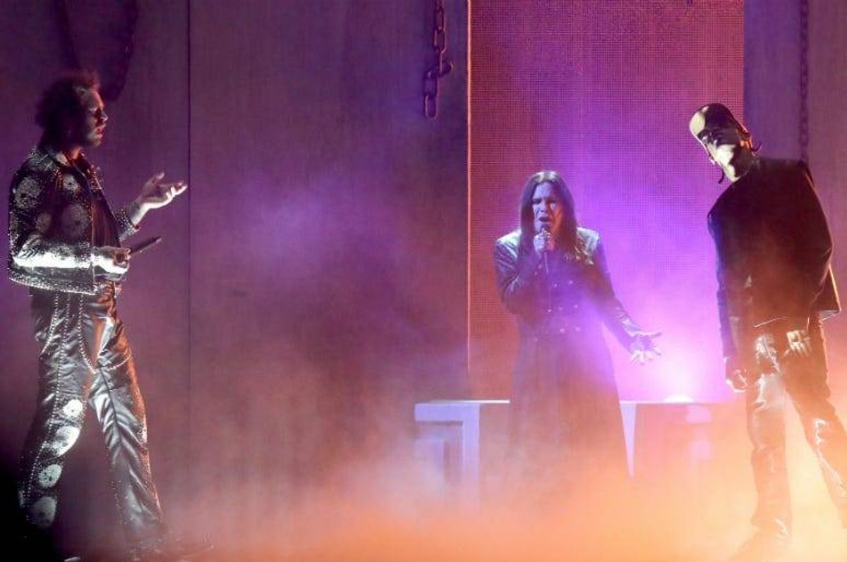 Post Malone, Ozzy Osbourne and Travis Scott perform onstage during the 2019 American Music Awards