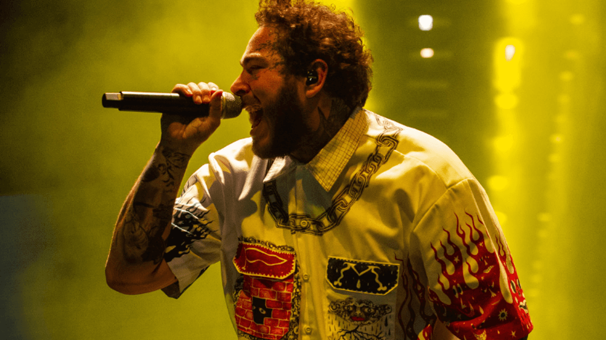 Post Malone performs on stage at The Resorts World Arena on 16 February 2019 in Birmingham, England