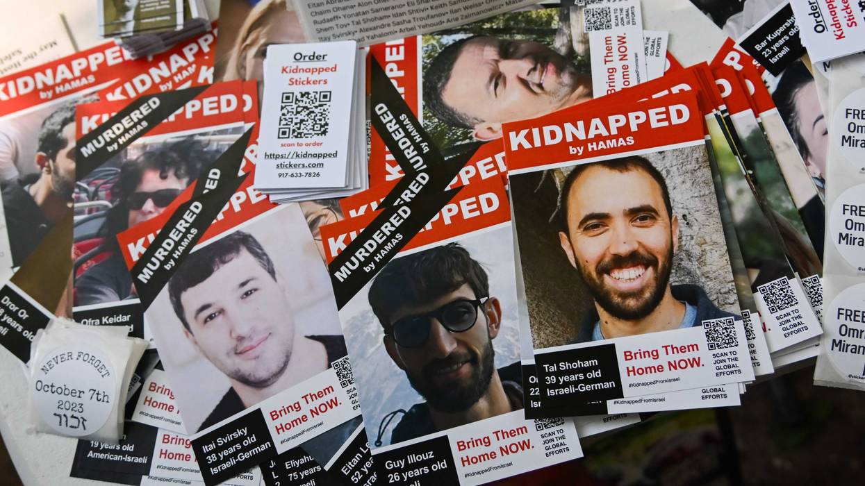 Posters of Israeli hostages are seen during a rally to mark the first anniversary of the October 7th terror attacks on Israel on October 06, 2024 in New York City.