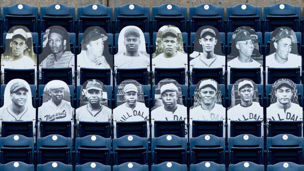 Posters of Negro League players in the outfield stands at Citizens Bank Park