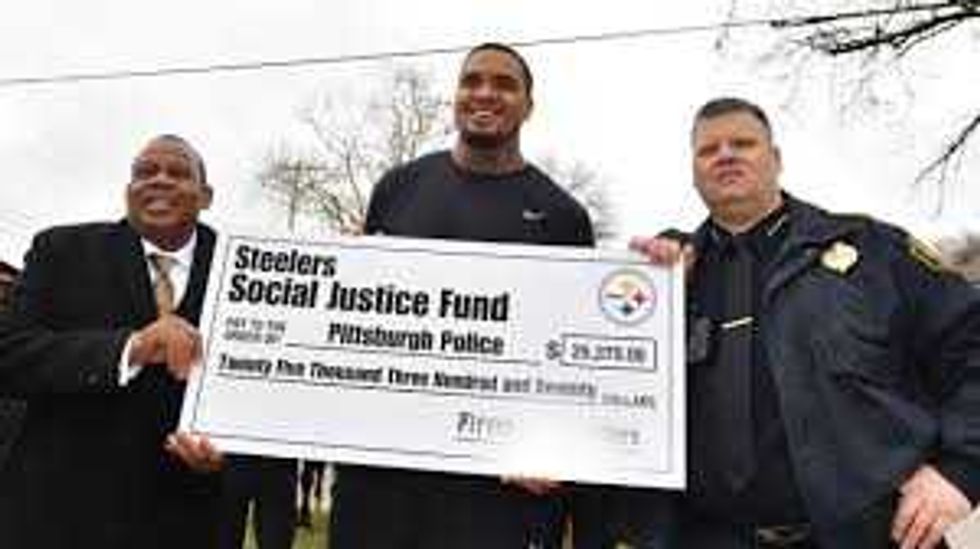 Pouncey with police chief Scott Schubert