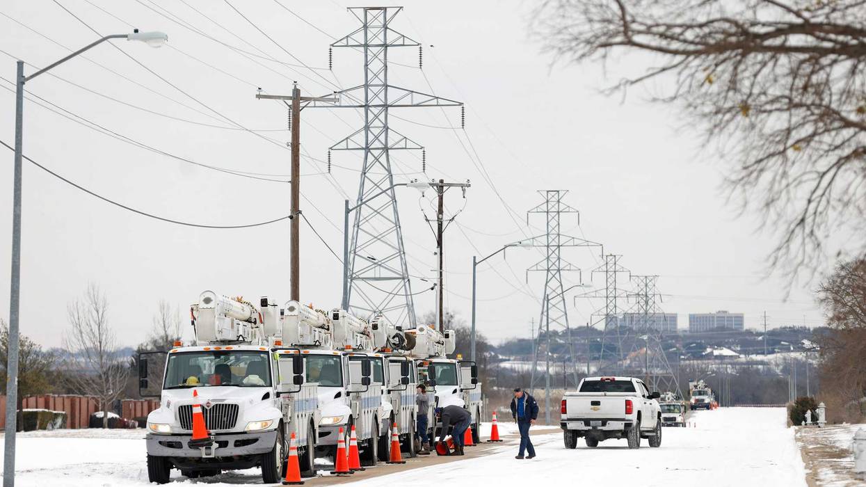 Power company trucks lined up in frigid Fort Worth, TX.