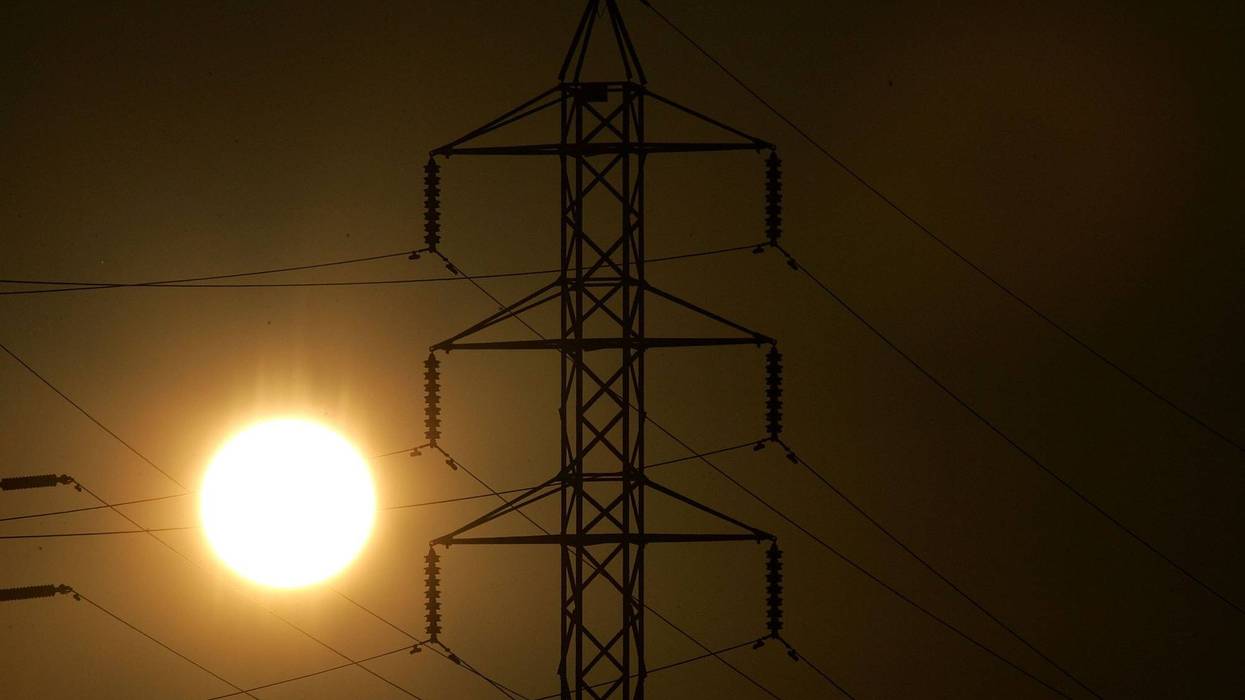 Power towers are seen as the sun sets July 24, 2006 in San Rafael, California.