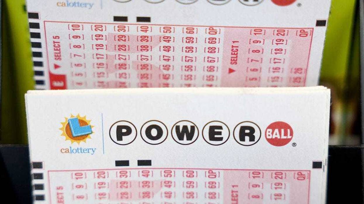 Powerball play slips are displayed in a convenience store on July 18, 2023 in Los Angeles, California.