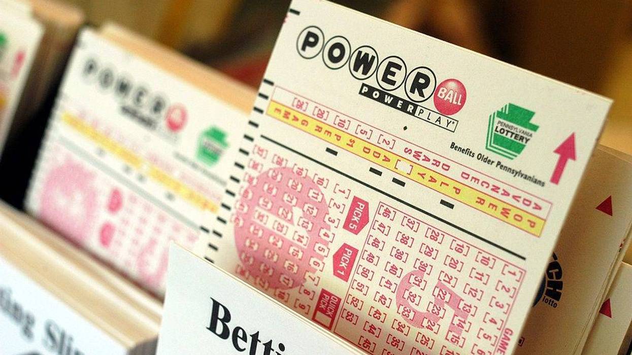 Powerball tickets await players at Cumberland Farms convenience store May 10, 2004 in Washington Crossing, Pennsylvania. The winner of the May 8th $213 million dollar Powerball jackpot has yet to come forward. For selling the winning ticket, the Cumberland Farms store will receive $400,000.