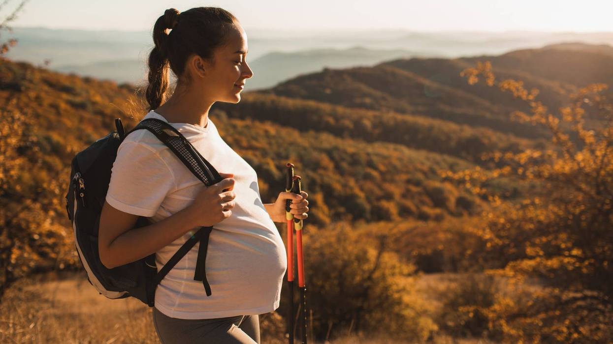 Pregnant Woman On A Hike