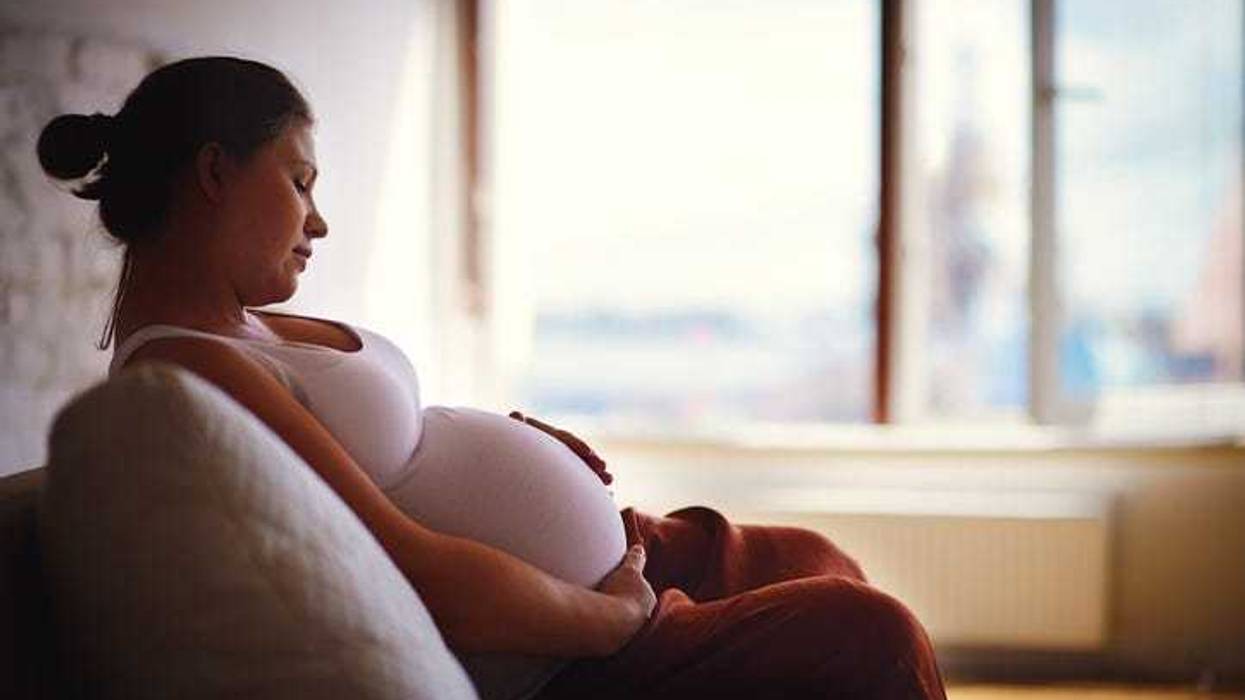 Pregnant woman sitting