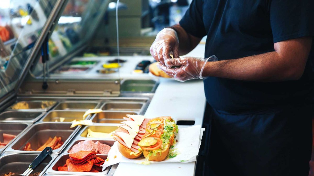 preparing sandwich in the restaurant - stock photo
