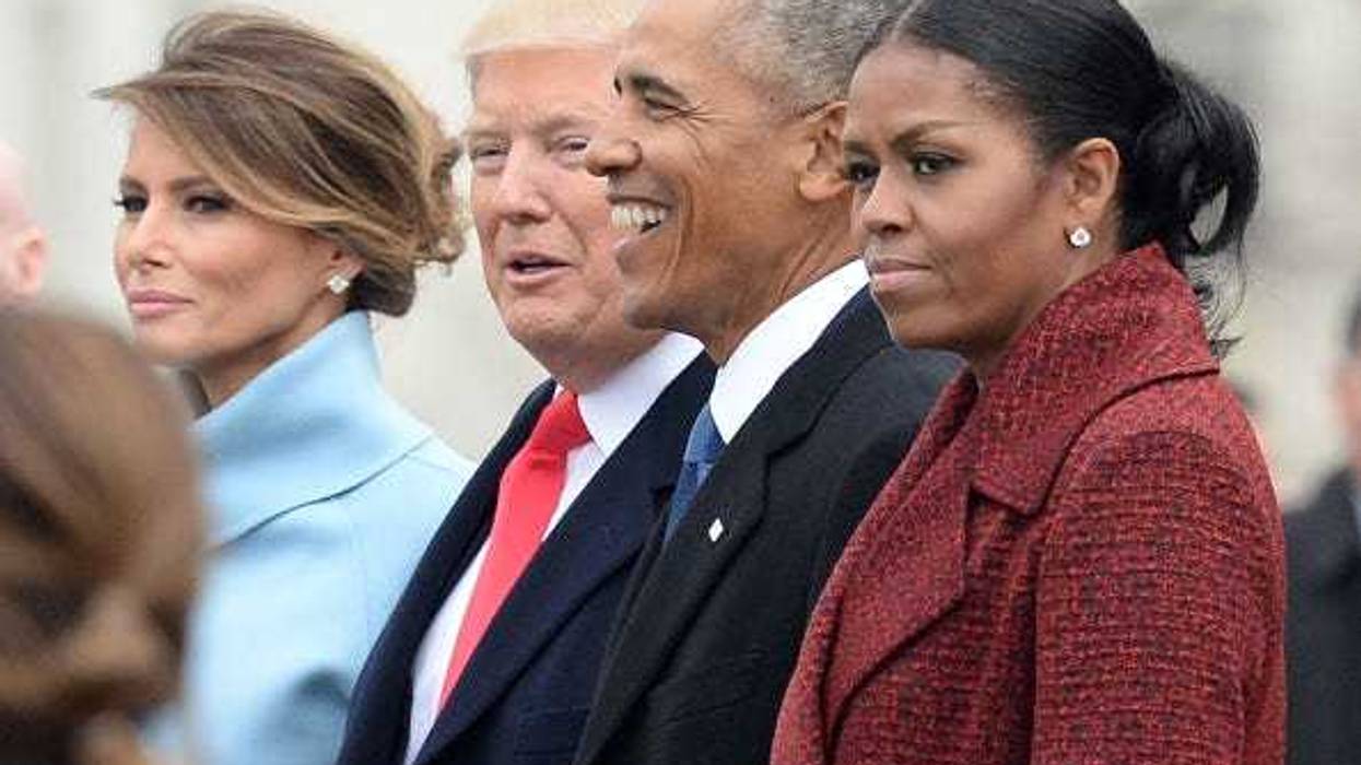 President Donald Trump (2nd-L) First Lady Melania Trump (L), former President Barack Obama (2nd-R) and former First Lady Michelle Obama walk together following the inauguration, on Capitol Hill in Washington, D.C. on January 20, 2017.