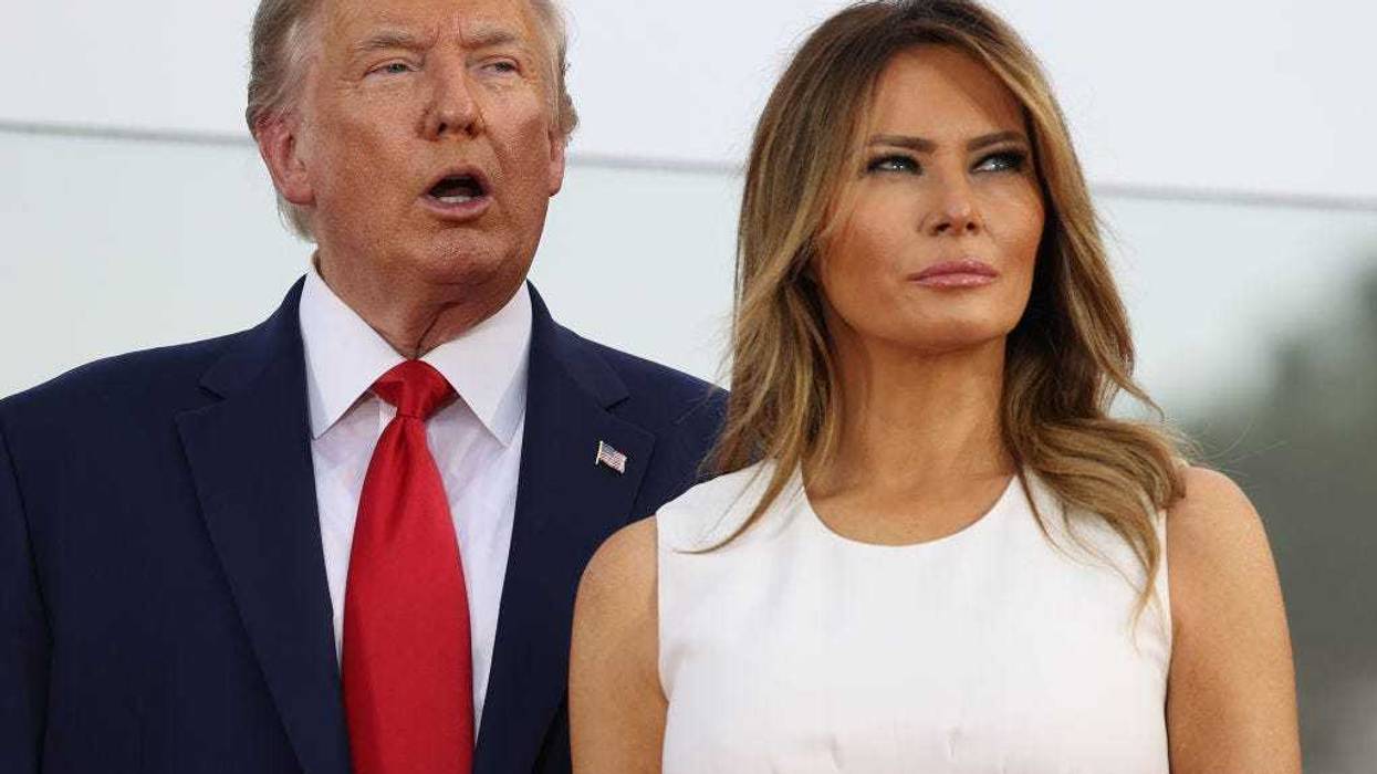 President Donald Trump and first Lady Melania Trump participate in an event on the South Lawn of the White House on July 04, 2020 in Washington, DC. President Trump is hosting a "Salute to America" celebration that includes flyovers by military aircraft and a large fireworks display. (Photo by Tasos Katopodis/Getty Images)