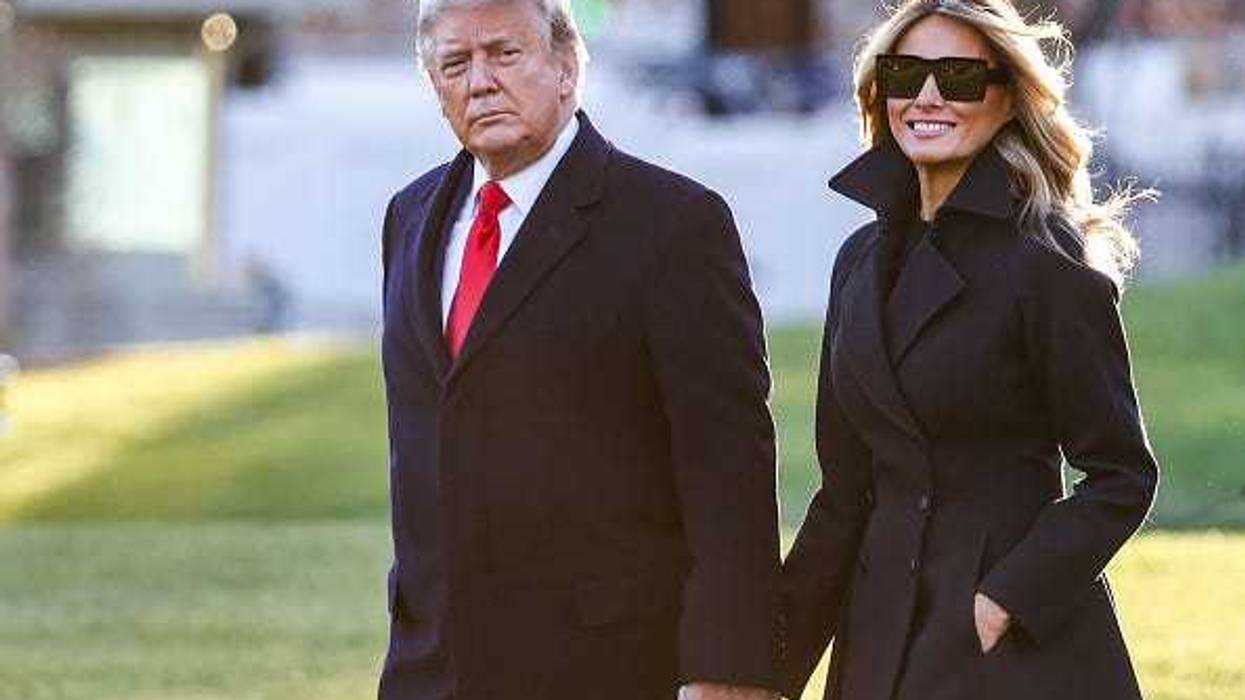 President Donald Trump and first lady Melania Trump walk on the south lawn of the White House on December 23, 2020 in Washington, DC. The Trumps are headed to Mar-a-Lago for the holidays with a government shutdown possible on Monday December 28.