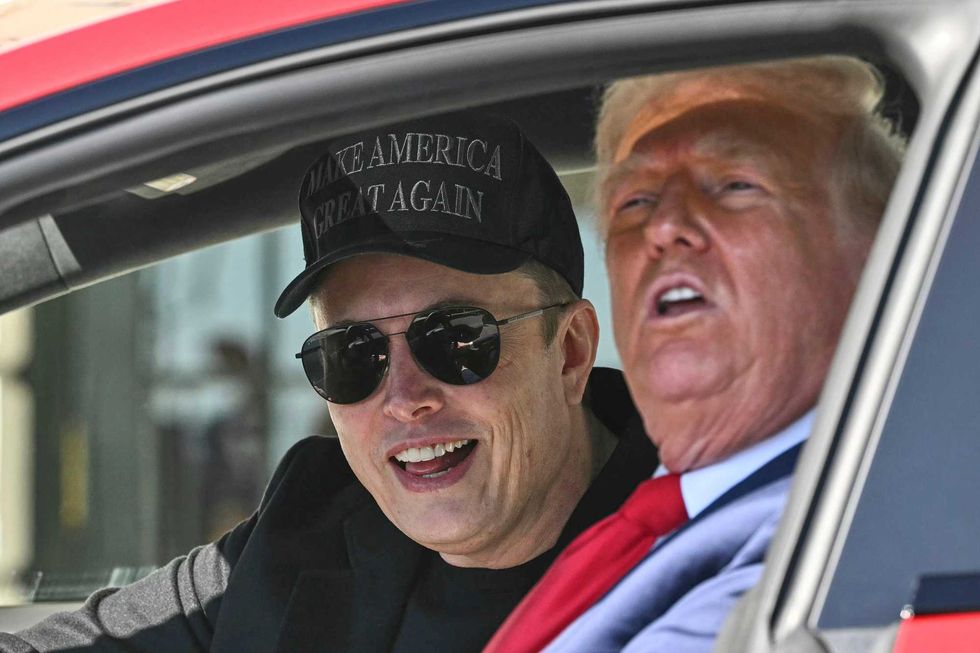 President Donald Trump and Tesla CEO Elon Musk speak to reporters as they sit in a Tesla vehicle on the South Lawn of the White House Tuesday, March 11, 2025, in Washington