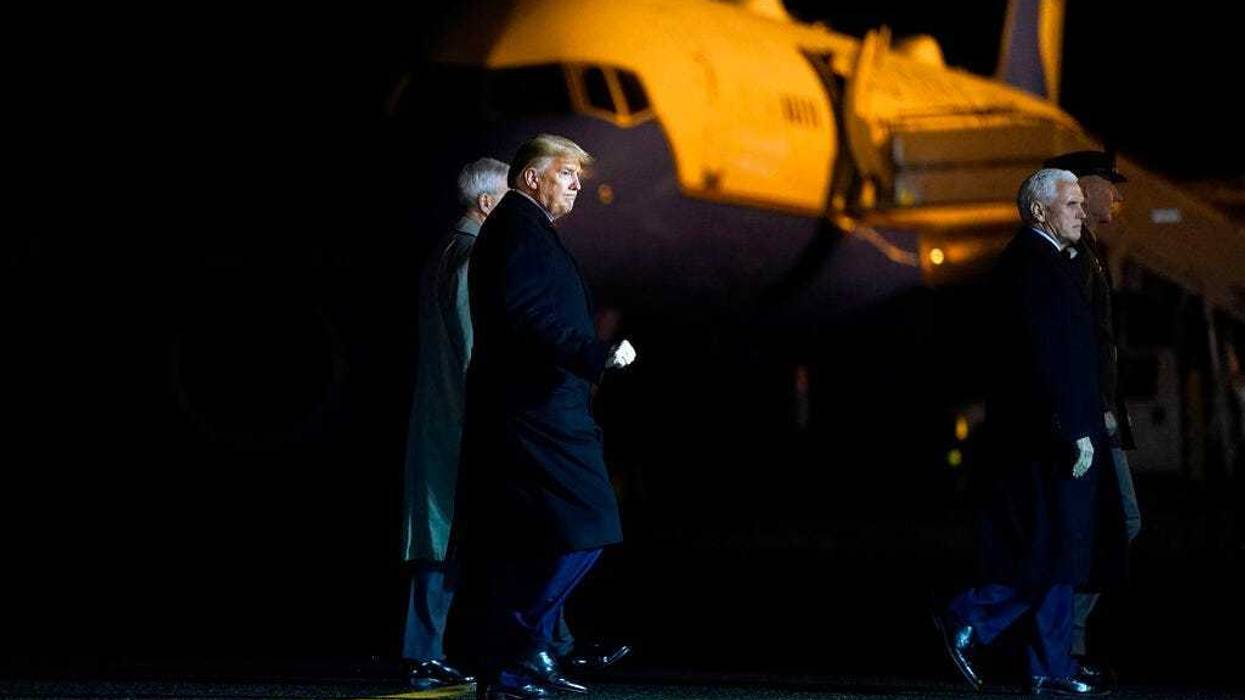 President Donald Trump and Vice President Mike Pence depart after watching a casualty return for Sgt. 1st Class Javier Gutierrez, of San Antonio, Texas and Sgt. 1st Class Antonio Rodriguez