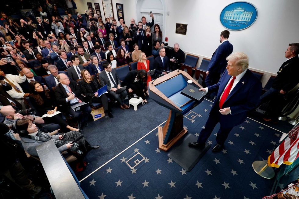 President Donald Trump arrives for a press conference on the crash at the Brady Press Briefing Room at the White House on January 30, 2025