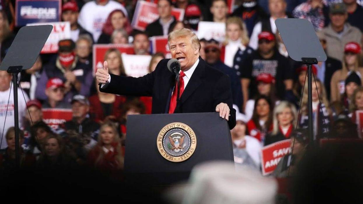 President Donald Trump attends a rally in support of Sen. David Perdue (R-GA) and Sen. Kelly Loeffler (R-GA) on December 05, 2020 in Valdosta, Georgia. The rally with the senators comes ahead of a runoff election for Perdue and Loeffler on January 5th.