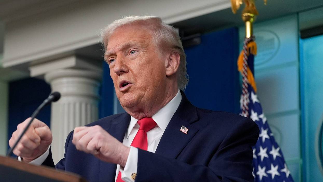 President Donald Trump gestures while he speaks in the James Brady Press Briefing Room at the White House, Tuesday, Jan. 20, 2026, in Washington.