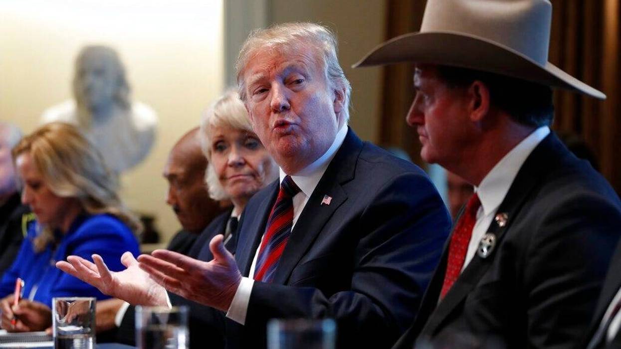 President Donald Trump leads a roundtable discussion on border security with local leaders, Friday, Jan. 11, 2019