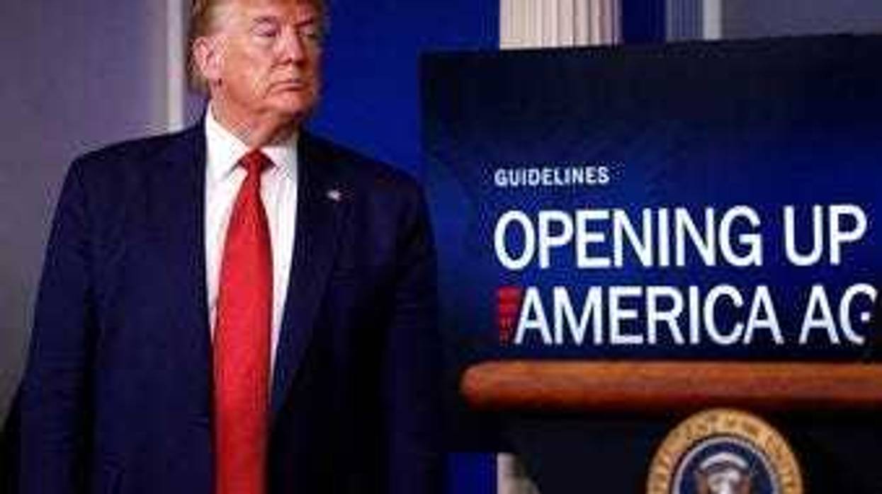President Donald Trump listens during a briefing about the coronavirus in the James Brady Press Briefing Room of the White House, Thursday, April 16, 2020, in Washington. (AP Photo/Alex Brandon)