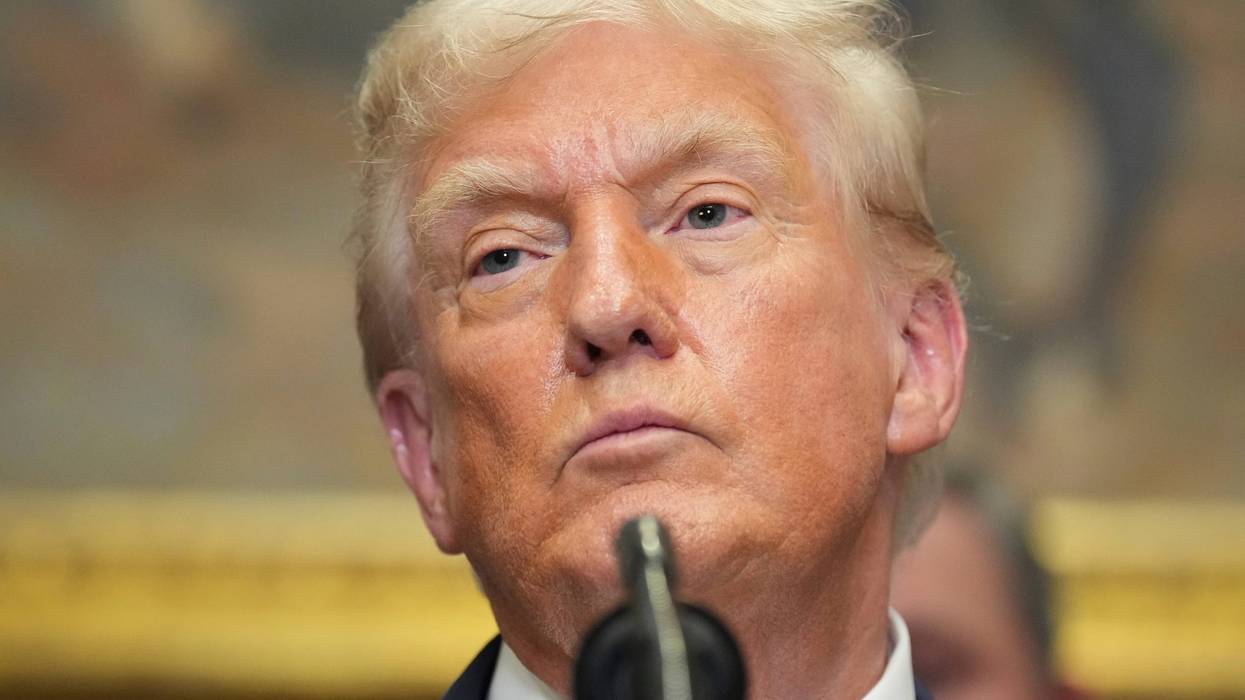 President Donald Trump listens during an event to sign an executive order restarting the Presidential Fitness Test in public schools, Thursday, July 31, 2025, in the Roosevelt Room of the White House in Washington