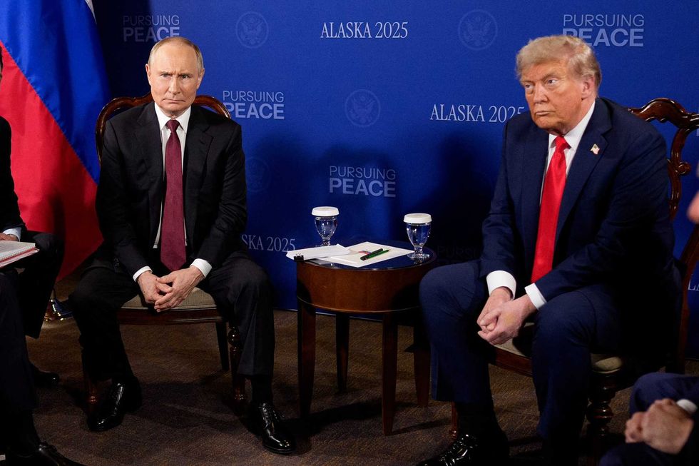 President Donald Trump (R) and Russian President Vladimir Putin (L) hold a meeting at Joint Base Elmendorf-Richardson on August 15, 2025 in Anchorage, Alaska