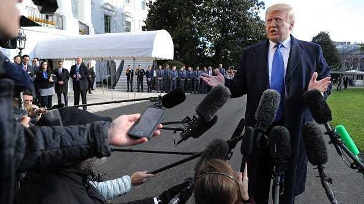 President Donald Trump reporters