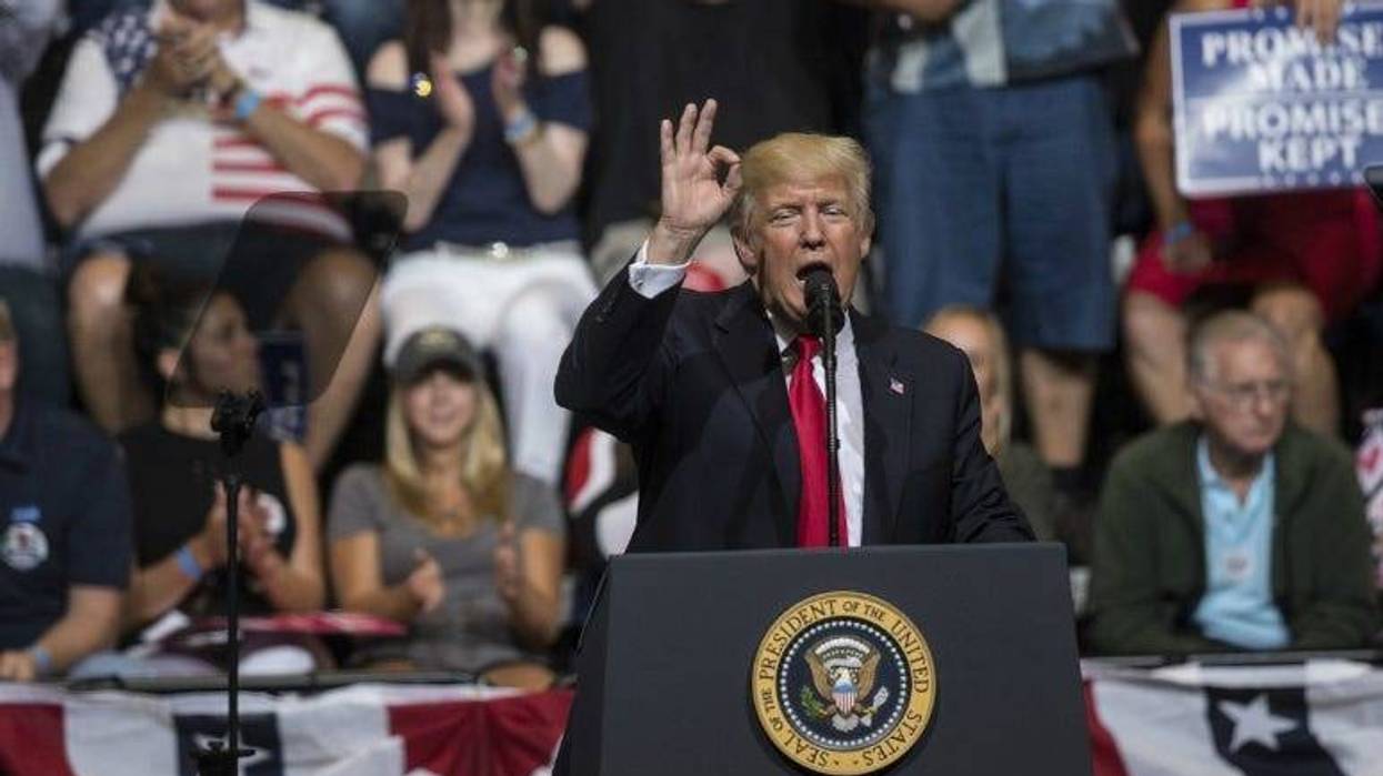 President Donald Trump speaks at the US Cellular Center for a rally.