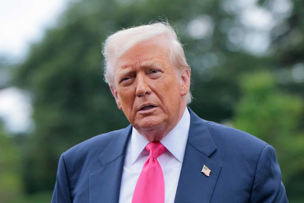 President Donald Trump speaks to the media as he departs the White House on July 15, 2025