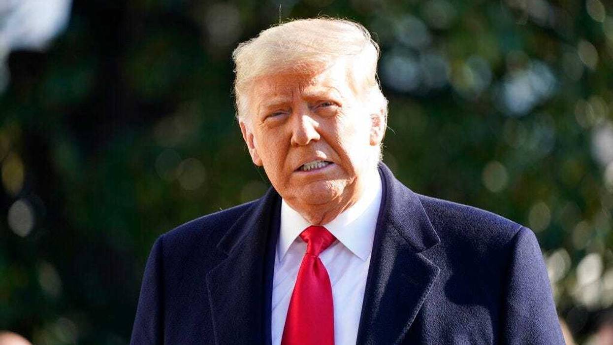 President Donald Trump speaks to the media before boarding Marine One on the South Lawn of the White House, Tuesday, Jan. 12, 2021 in Washington. The President is traveling to Texas. (AP Photo/Gerald Herbert)