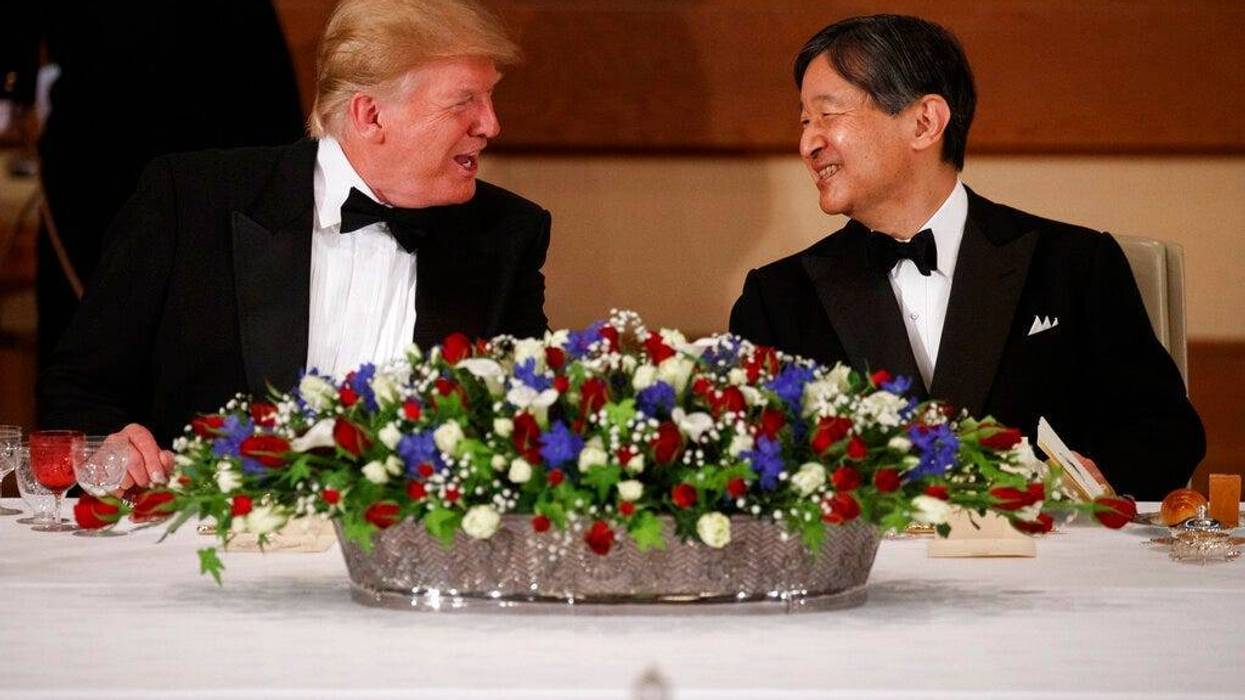 President Donald Trump talks with Japanese Emperor Naruhito during a State Banquet at the Imperial Palace, Monday, May 27, 2019, in Tokyo.