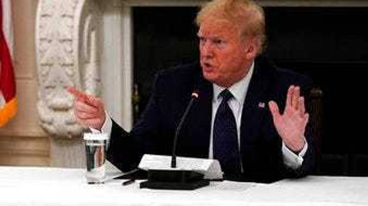 President Donald Trump tells reporters that he is taking zinc and hydroxychloroquine during a meeting with restaurant industry executives about the coronavirus response. (AP Photo/Evan Vucci)