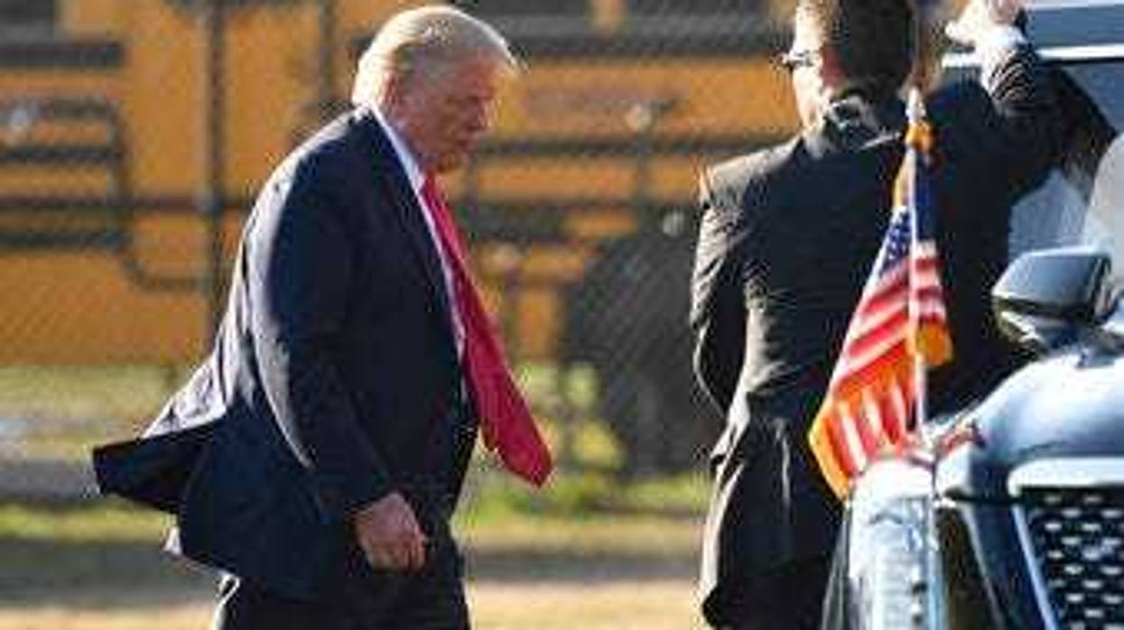 President Donald Trump walks to his car after arrive in Southampton, N.Y., on Marine One, Saturday, Aug. 8, 2020. Trump is attending two fundraisers during his visit to the Hamptons. (AP Photo/Susan Walsh)