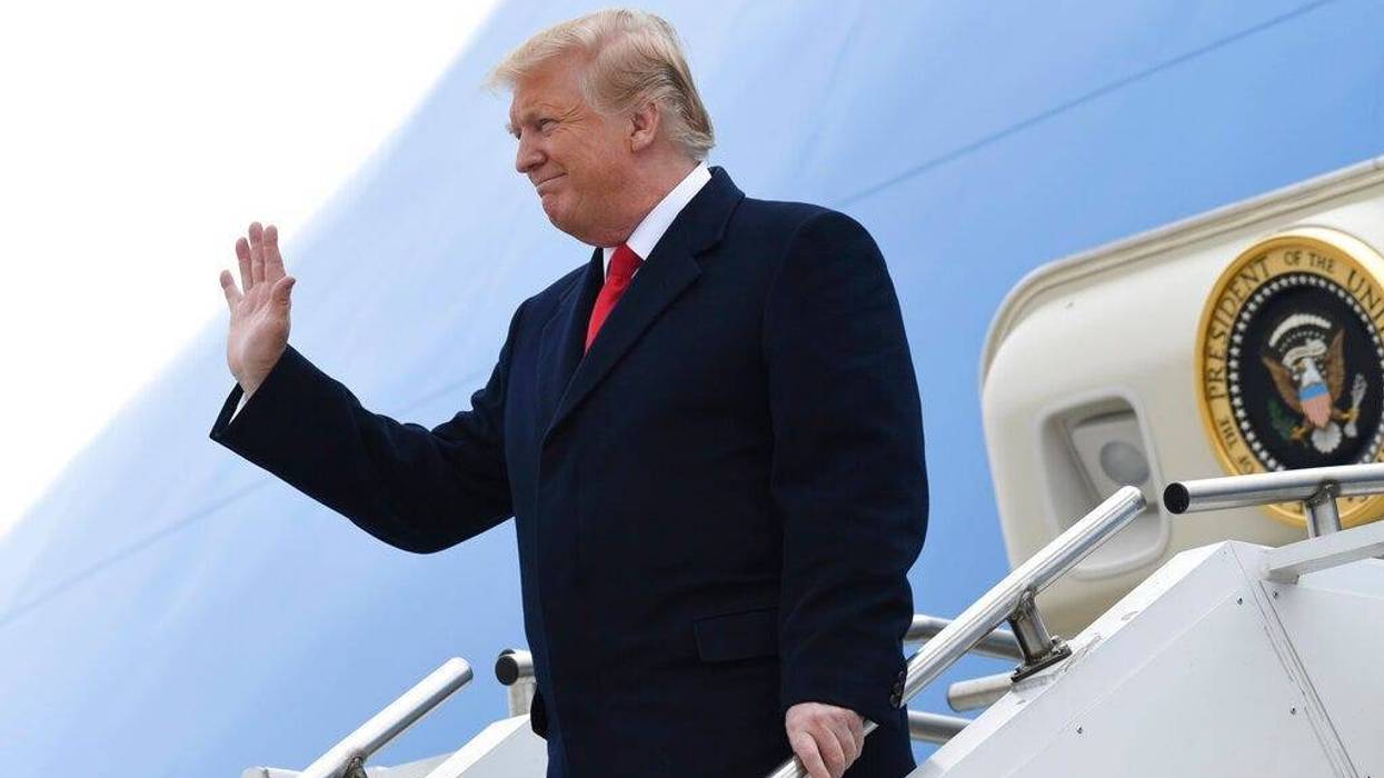 President Donald Trump walks towards the steps of Air Force One at Andrews Air Force Base.
