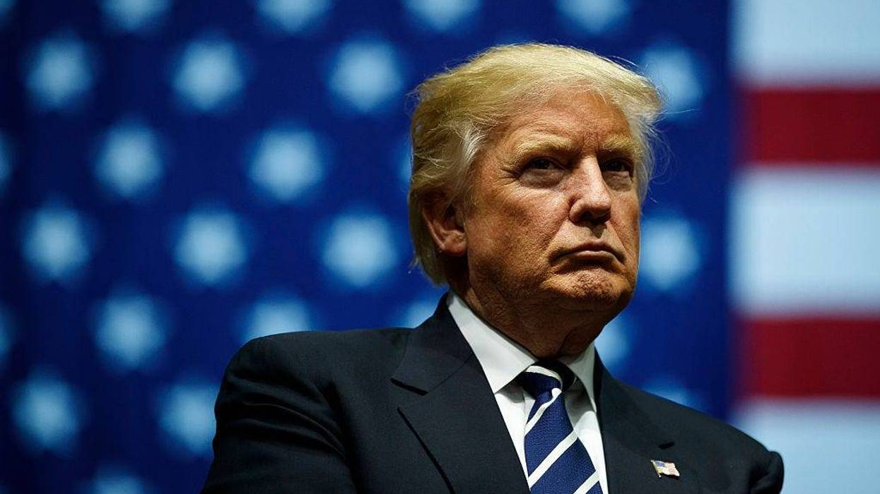 President-elect Donald Trump looks on during a rally on December 9, 2016 in Grand Rapids, Michigan.