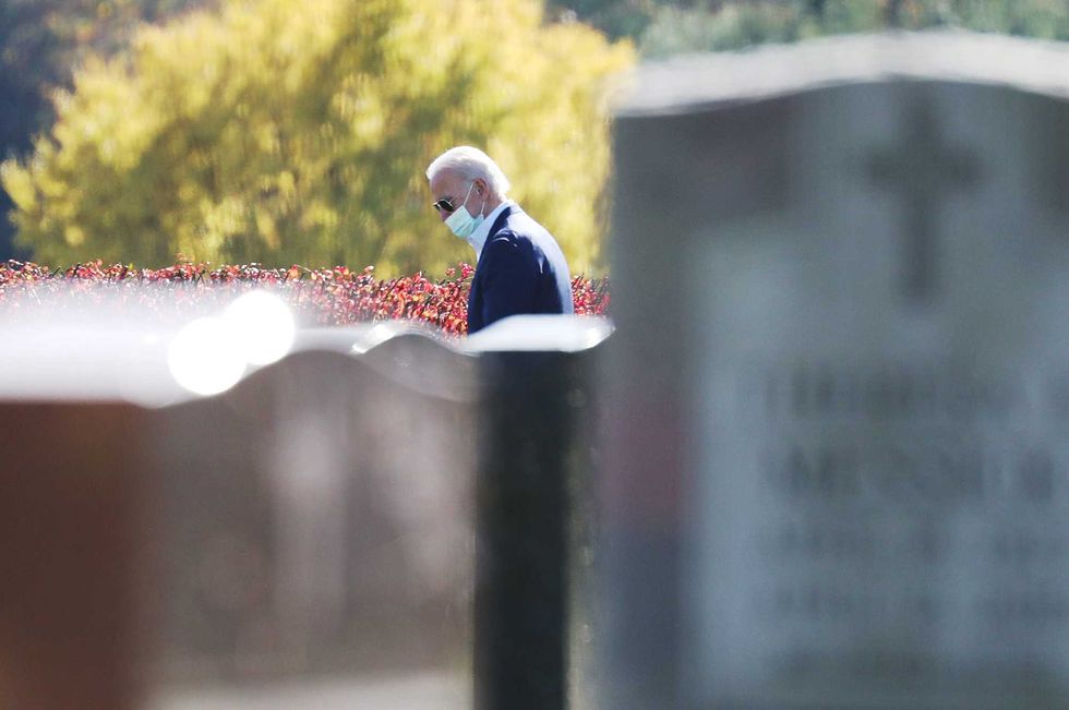 President-elect Joe Biden visits a family grave site after attending a mass at St. Joseph on the Brandywine Roman Catholic Church on November 08, 2020 in Wilmington, Delaware.