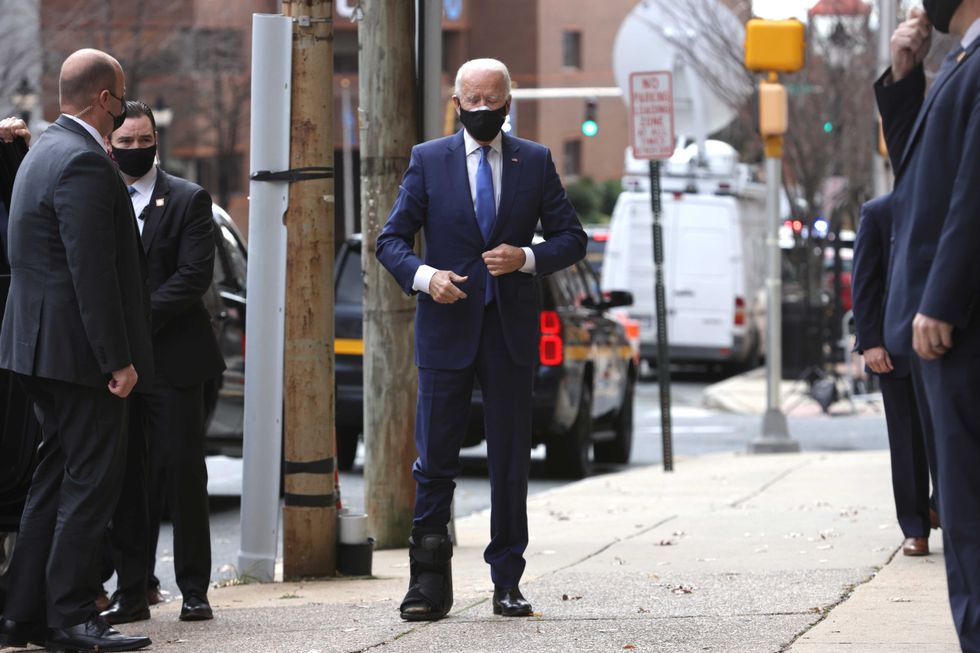 President-elect Joe Biden, wearing a walking boot due to hairline fractures after he strained his ankle playing with his dog Major, arrives at the Queen Theater to name his economic team on December 1, 2020 in Wilmington, Delaware. Biden is nominating and appointing key positions of the team, including Janet Yellen to be Secretary of the Treasury.