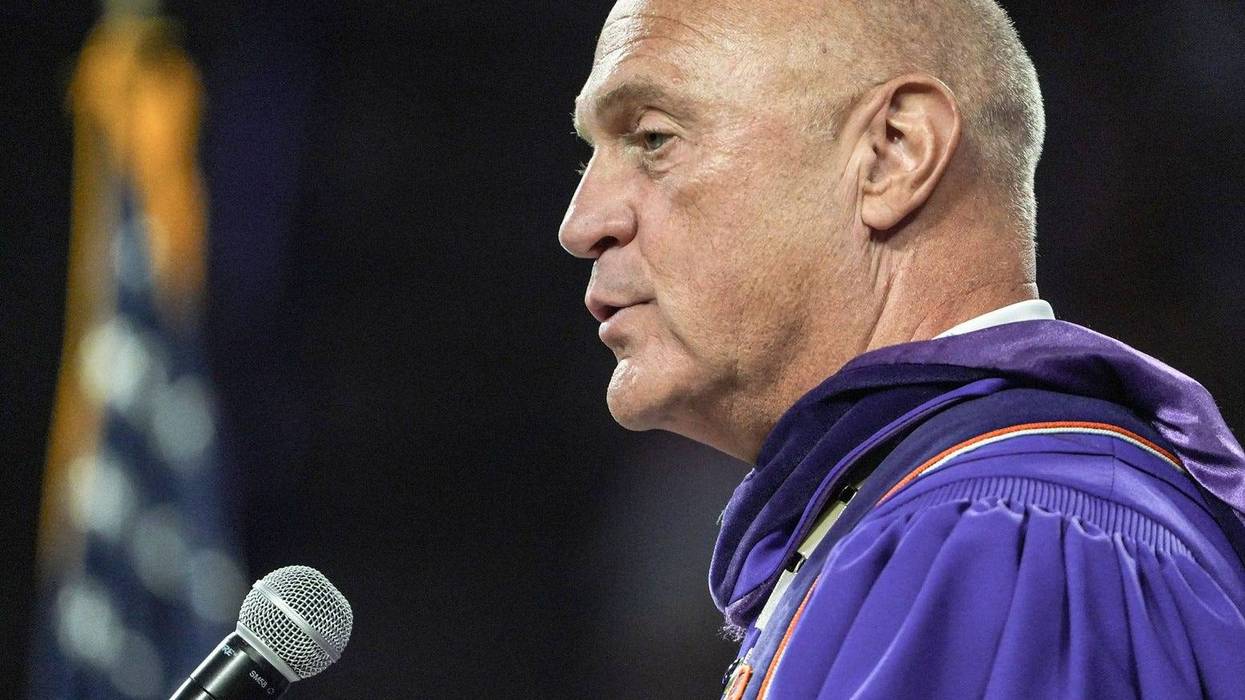 President Jim Clements speaks at the end of the Clemson University August graduation in Littlejohn Coliseum in Clemson Friday, August 8, 2025.
