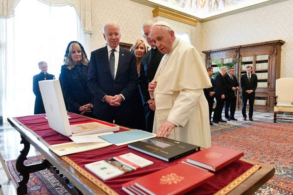 President Joe Biden and first lady Jill Biden exchange gifts with Pope Francis as they meet at the Vatican, Friday, Oct. 29, 2021