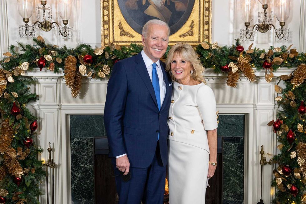 President Joe Biden and first lady Jill Biden pose for a Christmas photo at the White House