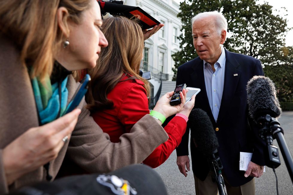 President Joe Biden declines to comment after reporters question him about the criminal indictment of former President Donald Trump as Biden departs the White House on March 31, 2023