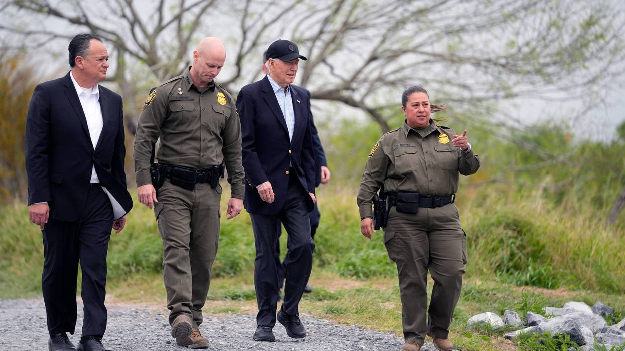 President Joe Biden looks over the southern border, Thursday, Feb. 29, 2024, in Brownsville, Texas. Walking with Biden are from l-r., Peter Flores, Deputy Commissioner, U.S. Customs and Border Protection, Jason Owens, Chief, U.S. Border Patrol and Gloria Chavez, Sector Chief, U.S. Border Patrol.