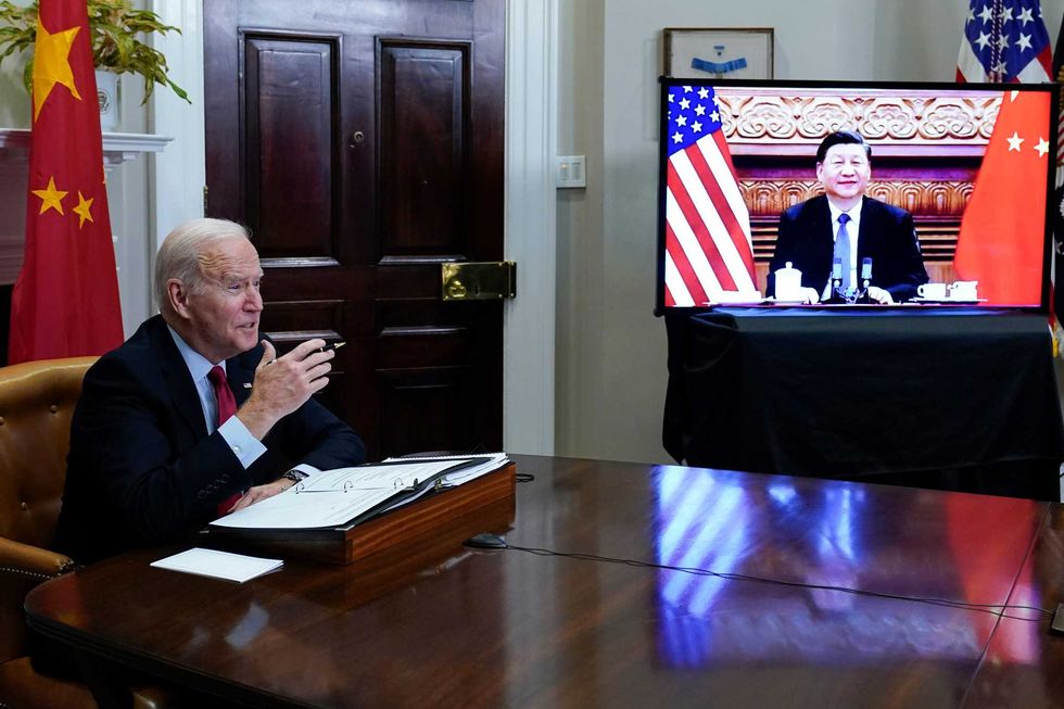 President Joe Biden meets virtually with Chinese President Xi Jinping from the Roosevelt Room of the White House in Washington, on Nov. 15, 2021