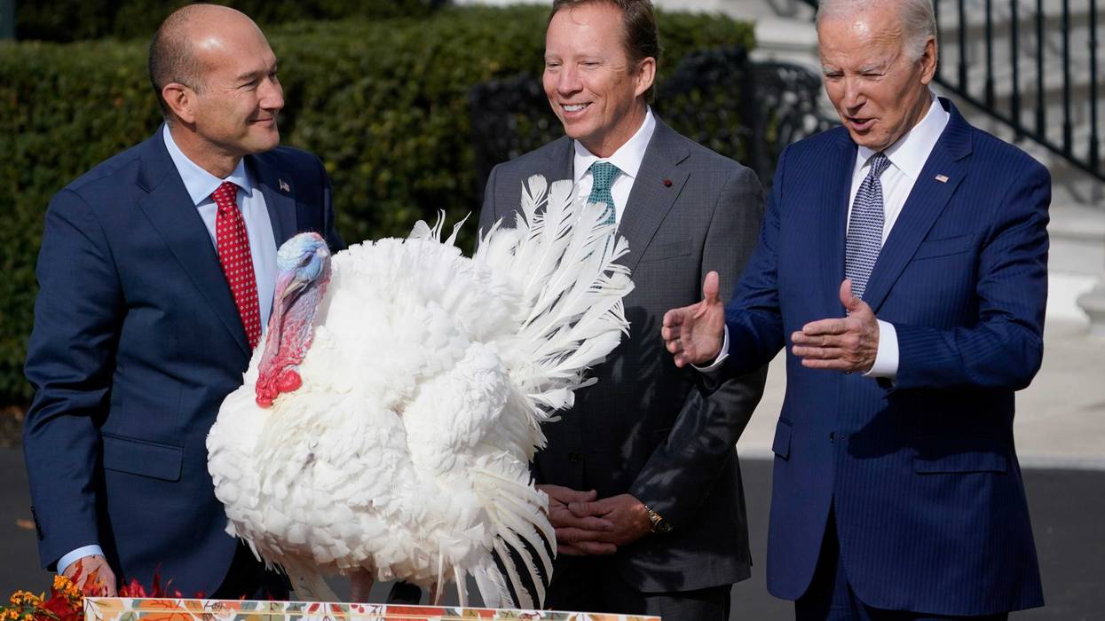 President Joe Biden pardons the National Thanksgiving Turkey Liberty during a ceremony at the White House on November 20, 2023 with Jose Rojas, left, Vice-President of Jennie-O Turkey Store, and Steve Lykken, middle, Chairman of the National Turkey Federation.