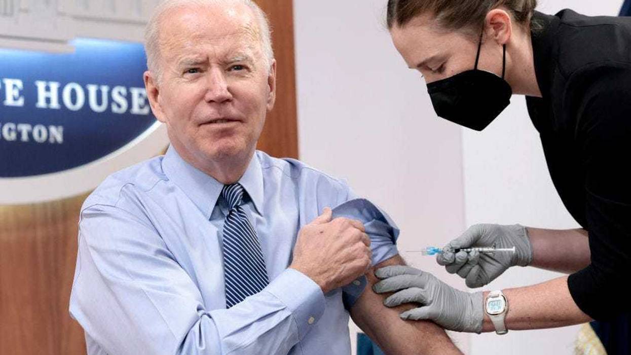 President Joe Biden receives a fourth dose of the Pfizer/BioNTech Covid-19 vaccine in the South Court Auditorium on March 30, 2022 in Washington, DC. Before receiving his second booster shot President Biden gave remarks calling on Congress to pass further legislation to provide more funding to aid the Covid-19 pandemic response. (Photo by Anna Moneymaker/Getty Images)