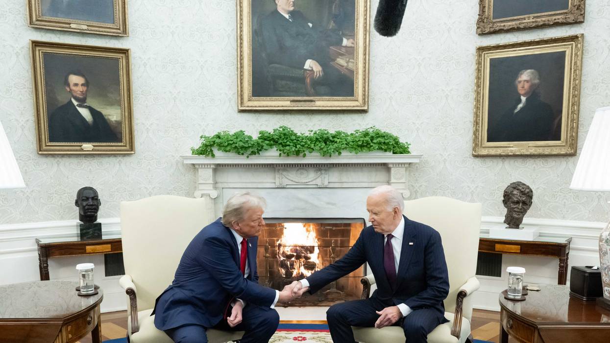 President Joe Biden shakes hands with President-elect Donald Trump during a meeting in the Oval Office of the White House on Nov. 13, 2024.