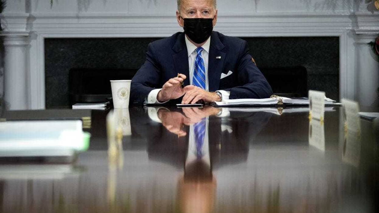 President Joe Biden speaks during a meeting with the White House COVID-19 Response Team in the Roosevelt Room of the White House December 16, 2021 in Washington, DC. Biden made a brief statement to the press regarding the Omicron variant of the coronavirus. (Photo by Drew Angerer/Getty Images)