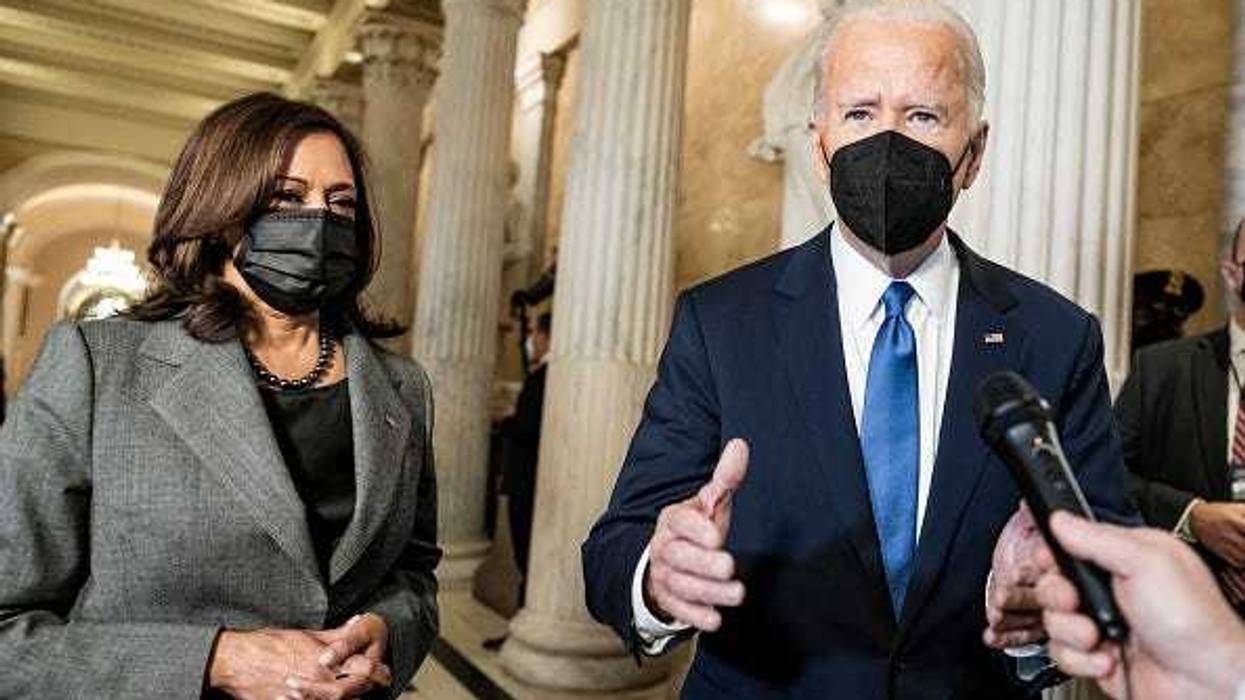 President Joe Biden speaks to the media as he departs with Vice President Kamala Harris.